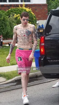 Pete Davidson walking out the tattoo shop wondering if he feels any different
