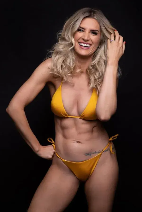 Hollyoaks’ Sarah Jayne Dunn strips down to orange bikini as she flaunts incredible figure