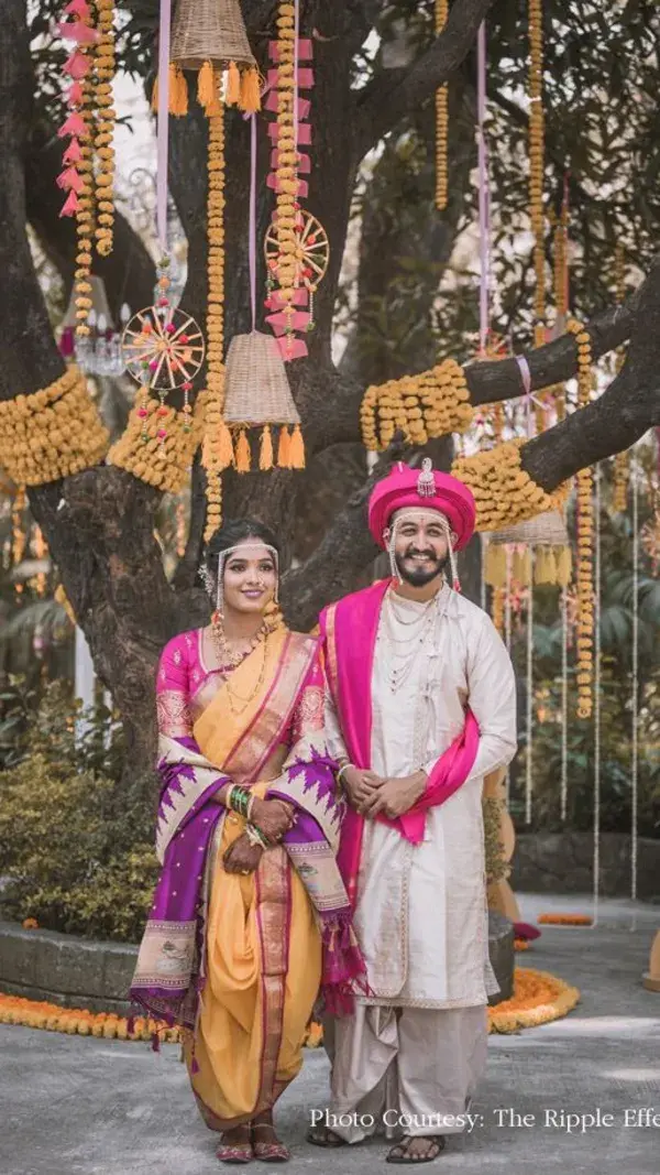 Traditional Marathi Bride in a Peach and Pink Nauvari saree