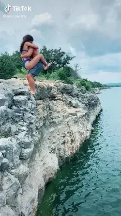 Couples backflip off the cliff