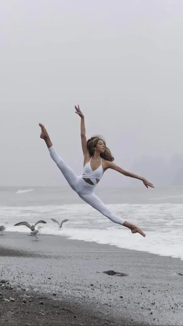 Beautiful dancer on the beach