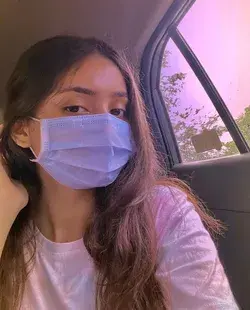 aesthetic girl in mask in car