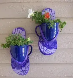 Reycling plastic bottles into planter box