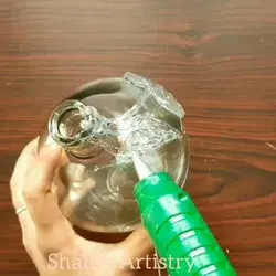 Bottle art with glue gun