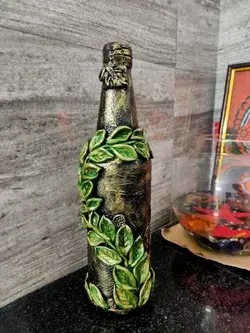Clay on bottle... Bottle art. Make your own designs..
