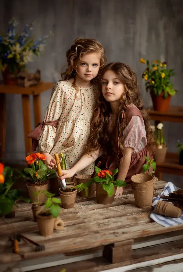 Girls plant seedlings 