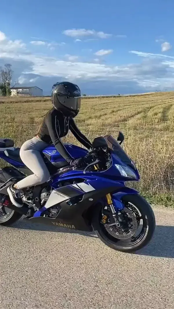 Girls ride a motorcycle