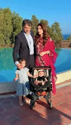 Aisha and Uqbah with their daughter