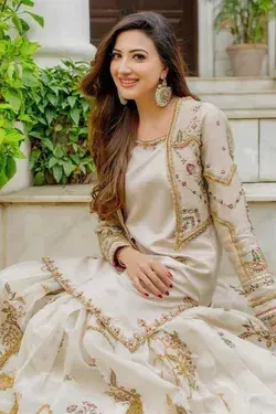 Aymen Saleem Beautiful Pictures in White and Gold Sharara Kameez