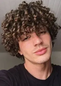 curly hair guy