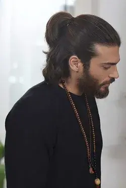 Can Yaman as Can Divit in Erkenci Kuş.