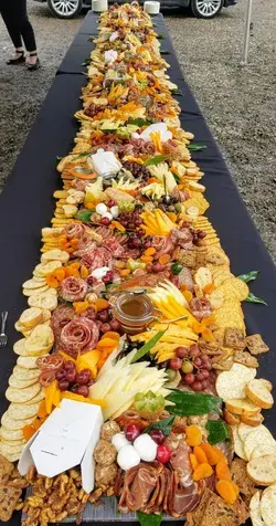 16 ft charcuterie by Creative Catering by Tara 