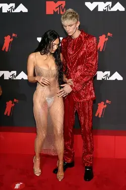Megan Fox grabs boyfriend Machine Gun Kelly’s privates on Billboard Awards red carpet in very revealing cut-out dress