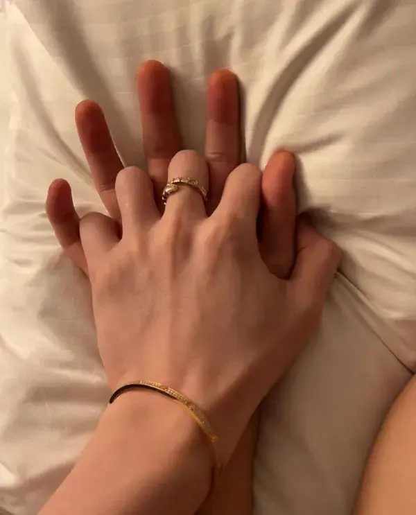 hands on bed