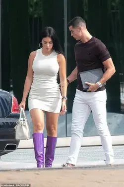 Georgina Rodriguez impresses in a cream dress and purple boots as she steps out with Cristiano…