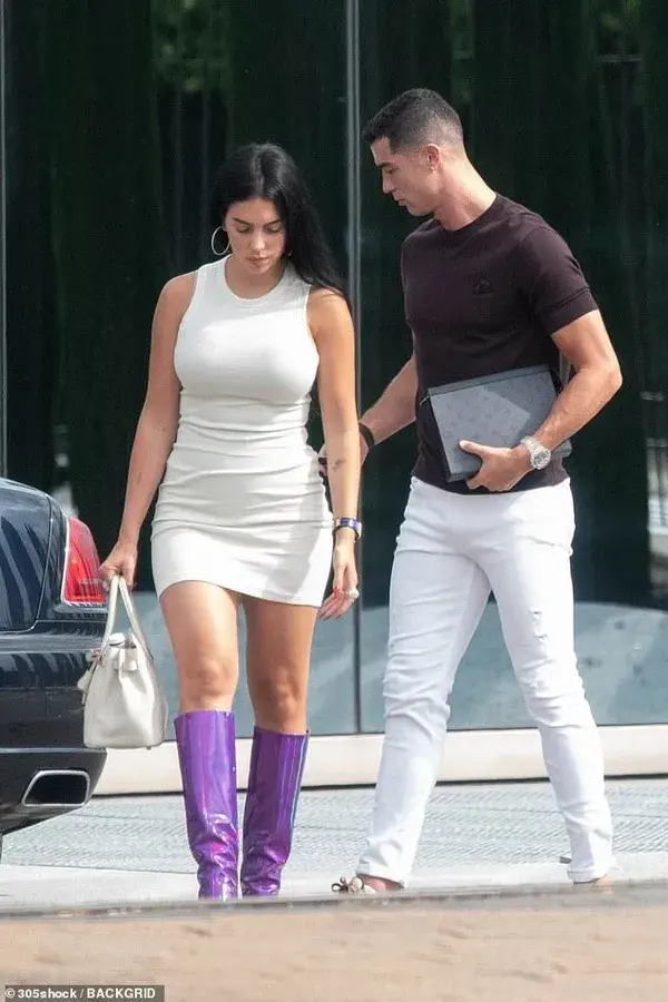 Georgina Rodriguez impresses in a cream dress and purple boots as she steps out with Cristiano…