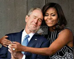 First Lady Michelle Obama Hugs Former President George W. Bush - 8X10 or 11X14 Photo (OP-627) [LG-145]