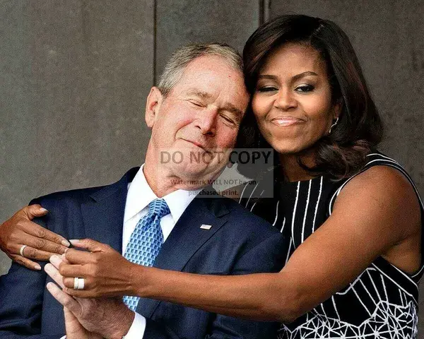 First Lady Michelle Obama Hugs Former President George W. Bush - 8X10 or 11X14 Photo (OP-627) [LG-145]