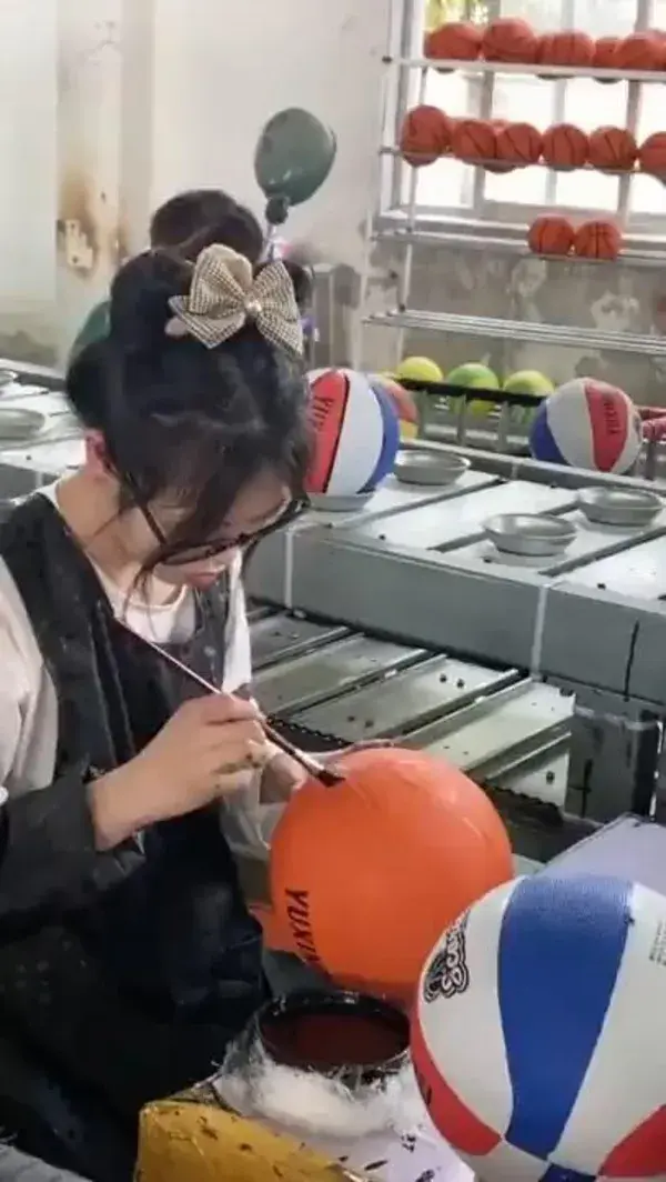 Applying the finishing touches to a Basketball
