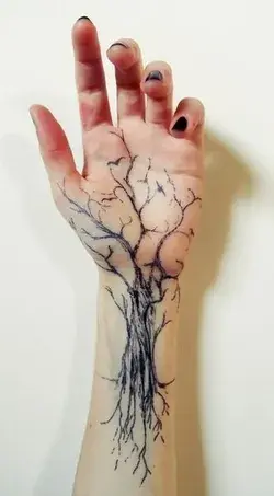 Stunning INFJ Wrist Tattoo nature tree roots branches 