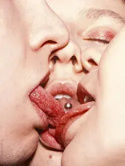 "Portrait Of Three Kissing People" by Stocksy Contributor "Stas Pylypets"