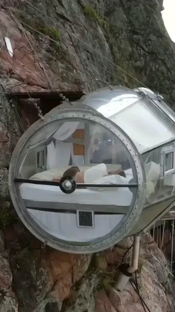 Would you dare? 🙄 Waking up inside a glass pod suspended 1,200ft/400m high on the cliff side