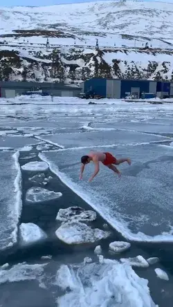 Refreshing your body and soul with a morning cold bath on Svalbard, Norway