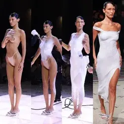 'Nude' Bella Hadid Has Dress Sprayed Onto Her on PFW Runway