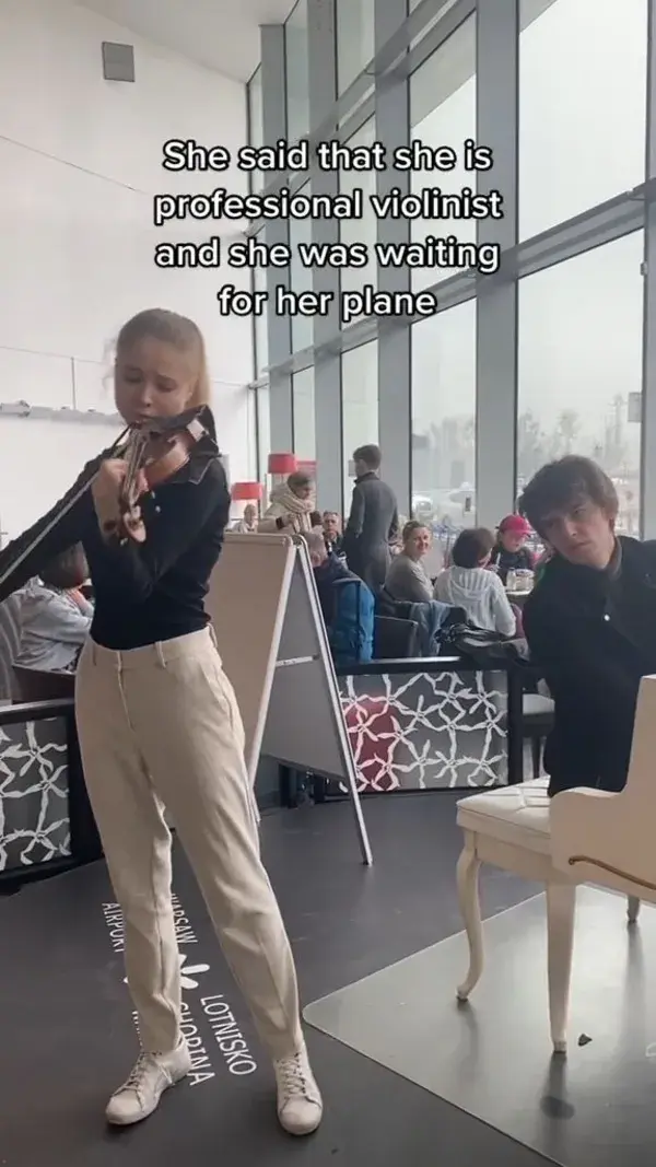 Pianist meets a violinist at the airport, and they make beautiful music together