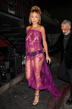 Rita Ora in Sheer dress with small panties peaking out