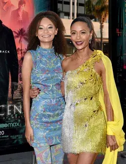 Thandiwe Newton gives daughter Nico Parker a helping hand on the red carpet