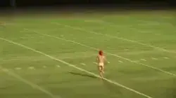 Streaker gets applause from the crowd at football game