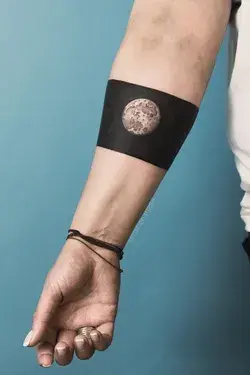 Hand band tattoo