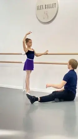 Little ballet dancer Yana Chirkina wearing a Zidans violet chiffon wrap skirt for girls