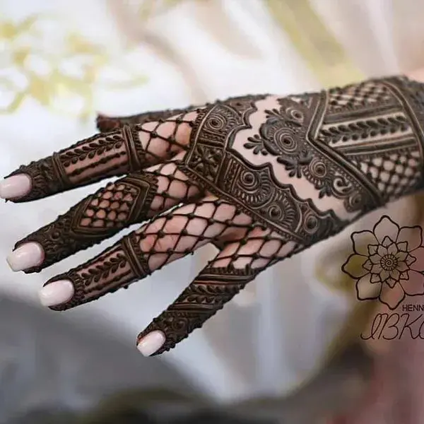 Dark and unique bridal mehendi design.