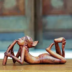 Wood statuette, 'The Flute Player'