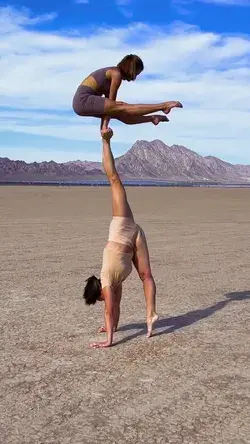 An impressive trick capturing Nastya and Katya performing an incredible acrobatic yoga