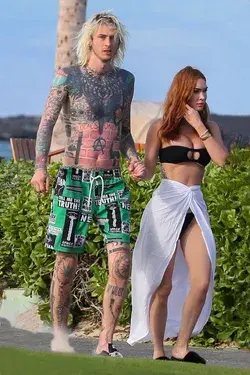 Megan Fox in bikini and MGK covered in tattoos (April 2023)