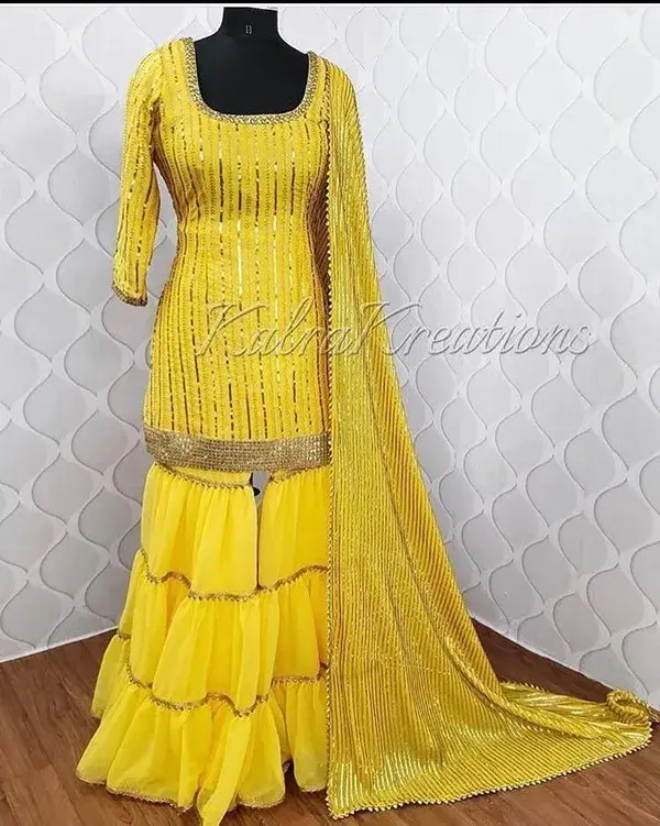 Yellow sharara suit with dupatta