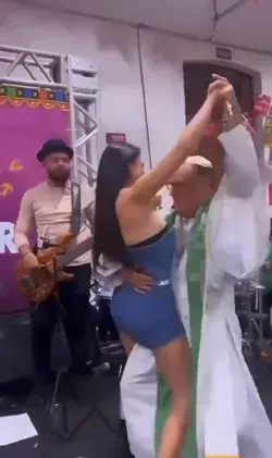 Religious Man Sexually Dancing with Latin Woman