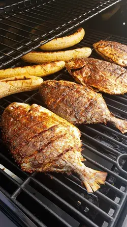 Juicy and Tasty Fish BBQ with Plantains and Veggies.