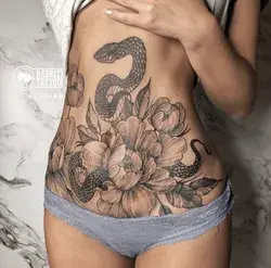 Flower and snake tattoo with Anastasia Kempff