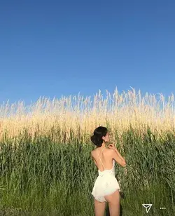 Cottage Core Girl next to the Wheat of Desire