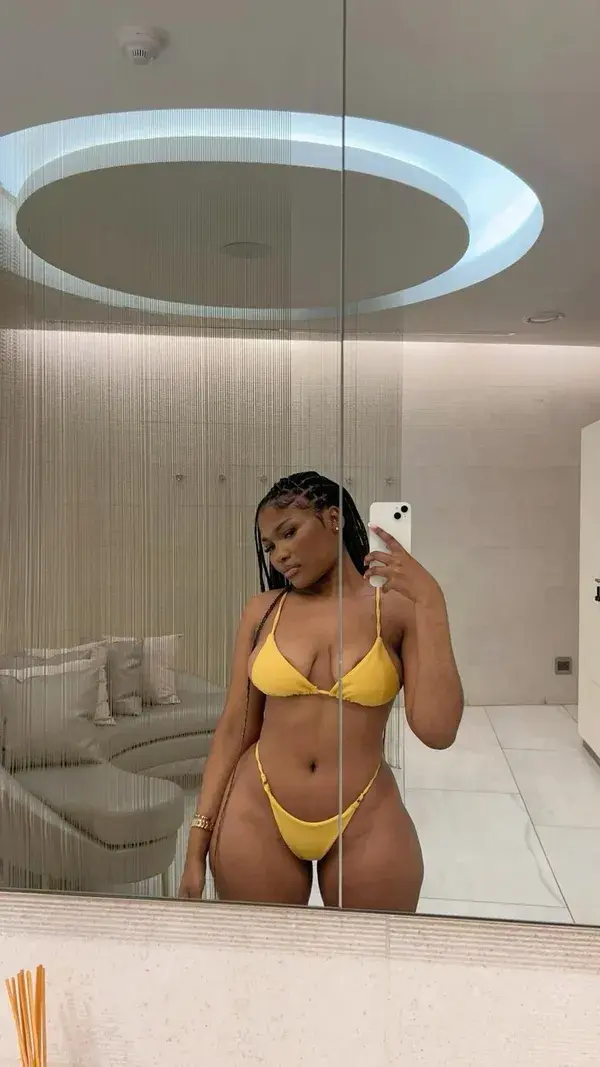 vacation babe | black girl travel | yellow bathing suit | knotless braids