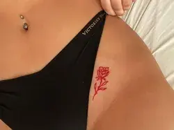 rose tattoo in red ink