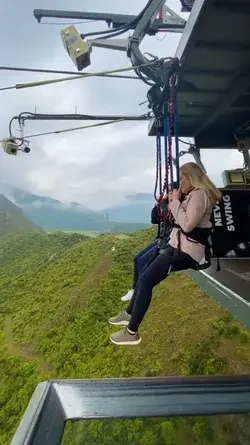 Tandem swinging at the most famous swing in the world