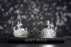 Holy Bible and a Kings Crown on a Dark Moody Background