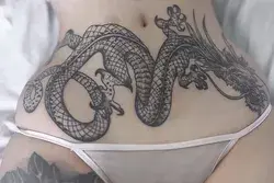 the tattoo right there gives bad bitch