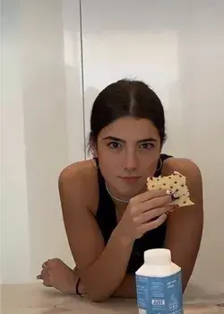 Charli eating snacks