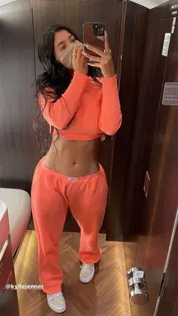 Kylie Jenner shows off her bare belly in new crop top and sweats after it’s revealed ‘she’s pregnant with second child’